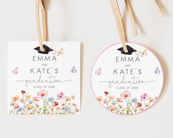May include: Two graduation gift tags with floral and butterfly designs. One is square, the other is round with a pink border. Both have the names "Emma and Kate's" and "graduation" with the year "Class of 2058".