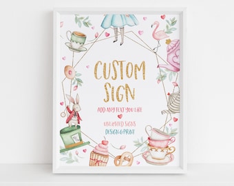 May include: A white frame with a white background and a gold glitter design. The design features a teacup, a flamingo, a cupcake, a rabbit, a hat, and a teapot. The text "CUSTOM SIGN" is in gold glitter. The text "ADD ANY TEXT YOU LIKE" is in black. The text "UNLIMITED SIGNS DESIGN & PRINT" is in black.