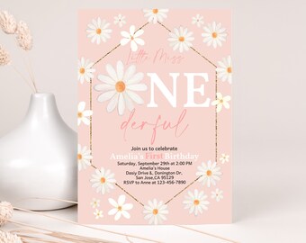 May include: A pink and white printable invitation with a gold glitter border and white daisies. The invitation says "Little Miss One Derful" and includes details for a first birthday party.