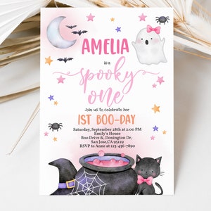 May include: A pink and purple Halloween-themed first birthday party invitation for Amelia. The invitation features a ghost, a witch's cauldron, a black cat, and stars. The text reads "Amelia is a spooky one. Join us to celebrate her 1st Boo-Day. Saturday, September 28th at 2:00 PM. Emily's House. Boo Drive & Donington Dr. San Jose, CA 95129. RSVP to Anne at 123-456-7890."
