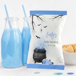 May include: Blue and white Halloween themed baby shower favor bag with a cauldron, bats, spider web, and pumpkins. The bag says "Emily's Baby Shower 10.28.2028".