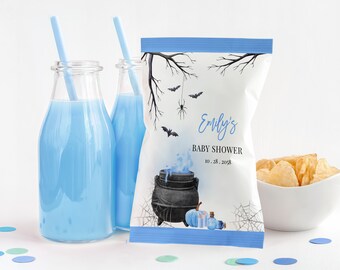May include: Blue and white Halloween themed baby shower favour bag with a cauldron, bats, spider web, and pumpkins. The bag says "Emily's Baby Shower 10.28.2028".