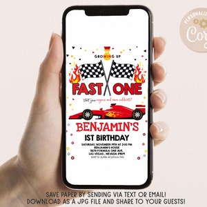 May include: A red, white and black race car birthday invitation with a chequered flag and flames. The invitation says "Growing Up Fast One" and "Benjamin's 1st Birthday".