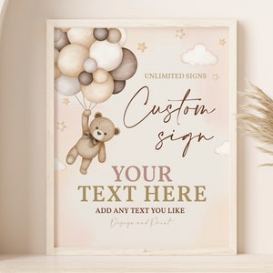 May include: A framed custom sign with a soft, neutral color palette. A teddy bear illustration floats with balloons. The sign reads "Custom sign" and "Your text here". The text "Add any text you like" is also included.