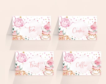May include: Four pink and gold tea party food labels with watercolor illustrations of teacups, teapots, and cupcakes. The labels read "Tea", "Cookie", "Fruit", and "Coffee".