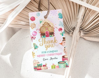 May include: A pink and white thank you tag with a gingerbread house, snowman, and candy canes. The text reads "Thank you for coming! Merry Christmas! Love, Amelia."
