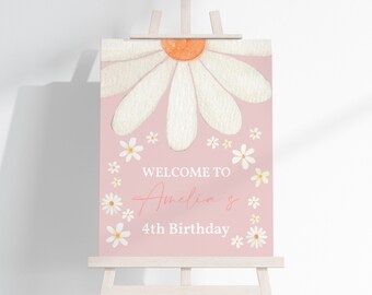 May include: A pink welcome sign with a large white daisy and smaller white daisies around the edges. The sign says "Welcome to Amelia's 4th Birthday".