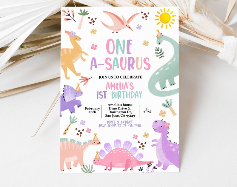 May include: A pink and green dinosaur birthday party invitation with the text "One A-saurus" and a party hat on a dinosaur. The invitation includes the date, time, and location of the party.