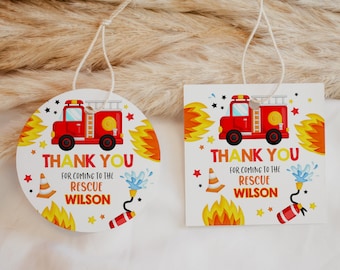 May include: Red and yellow thank you tags featuring a cartoon fire engine, flames, and stars. The text reads "Thank you for coming to the rescue Wilson".