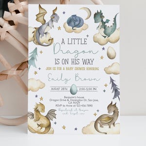 May include: A baby shower invitation with a watercolor illustration of a blue dragon. The invitation reads "A Little Dragon Is On His Way" and includes the name "Emily Brown" and the date "August 28th".
