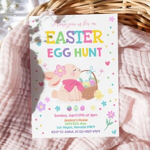 May include: A colorful invitation for an Easter egg hunt with a cartoon bunny holding a basket of eggs. The invitation includes the date, time, location, and contact information for RSVP.