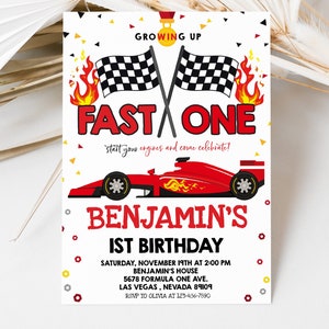 May include: A red, white and black birthday invitation featuring a red racing car and chequered flags. The text reads "Growing Up Fast One, start your engines and come celebrate! Benjamin's 1st Birthday. Saturday, November 19th at 2:00 PM, Benjamin's House, 5678 Formula One Ave., Las Vegas, Nevada 89109, RSVP to Olivia at 123-456-7890."
