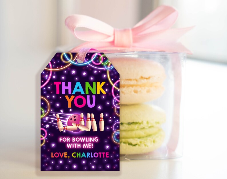 May include: A purple thank you tag with neon pink, green, blue, and yellow circles and stars. The tag says "Thank You" in rainbow letters and "For bowling with me! Love, Charlotte". There is a cartoon bowling ball and pins in the center of the tag.