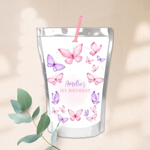Vlinder verjaardag sapzakje etiketten meisje 1e verjaardag decor roze paarse vlinders bloemen lente tuinfeest drankje label afdrukbaar BT93V