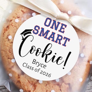 May include: A set of three ceramic mugs with a speckled, matte finish. The mugs are in shades of cream, light gray, and dark gray. Each mug has a simple, minimalist design, perfect for coffee or tea.
