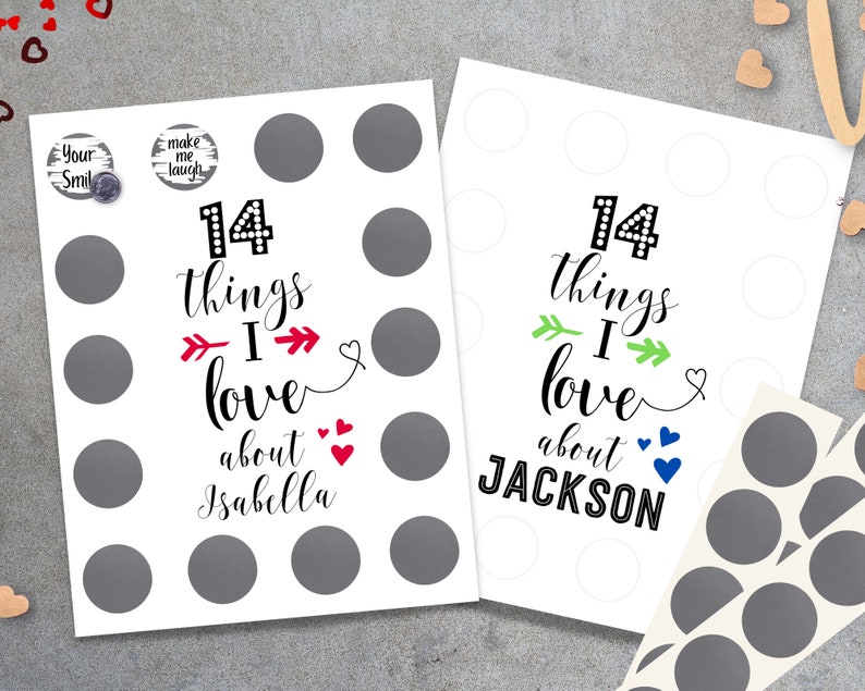 May include: Two white cards with black text that reads "14 things I love about Isabella" and "14 things I love about JACKSON". Each card has 14 gray circles for stickers. There are two small round stickers that say "Your Smile" and "Make Me Laugh".