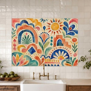 May include: A rectangular wall mural featuring a vibrant watercolor illustration of stylized suns, arches, and floral motifs in shades of orange, yellow, blue, and green, composed of multiple square tiles arranged in a grid pattern above a sink.