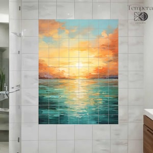 May include: A rectangular wall mural composed of square tiles featuring a sunset over the ocean. The sky displays vibrant orange, yellow, and soft blue clouds above a turquoise sea reflecting the golden light. The word Tempera is in the corner.