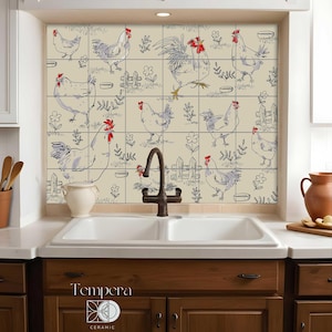 May include: Kitchen backsplash tiles with a repeating pattern of sketched chickens, roosters, and floral elements in shades of cream, blue, and red. The tiles are installed above a white double sink and dark brown cabinets.