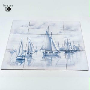 blue and withe tiles backsplash with boats in the sea