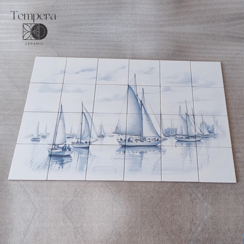 blue and withe tiles backsplash with boats in the sea