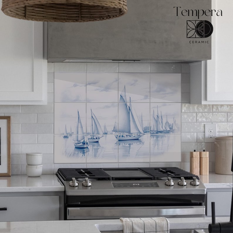 blue and withe tiles backsplash with boats in the sea
