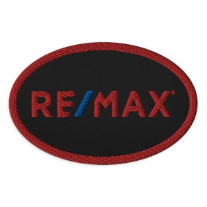 May include: Red and blue embroidered patch with the word "RE/MAX" in a circle.