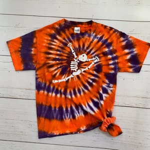 Leaping Gymnast or Dancer Skeleton tie dye shirt, orange tie dye, purple tie dye; customizable colors