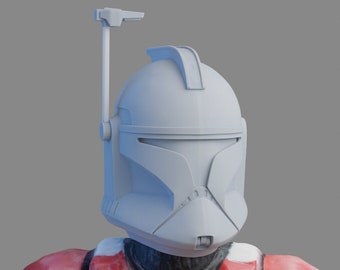 May include: A white plastic clone trooper helmet with a red and white chest plate. The helmet has a raised antenna on top.