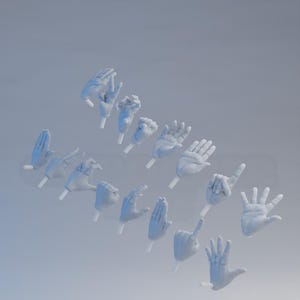 May include: A set of 14 white 3D printed hands in various poses, including a fist, a thumbs up, a peace sign, and a pointing finger. The hands are isolated against a light blue background.