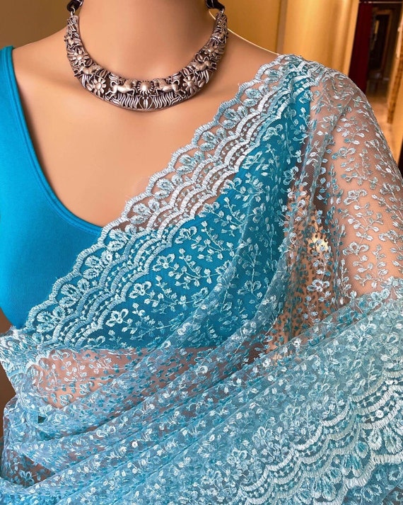 Sky Blue Net Saree With White Embroidery and Sequence All Over