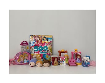 May include: A collection of Disney Princess themed items including a pink purse with a Cinderella design, a book with 500 stickers, a white mug with a Belle design, a small pink chair, a small pink mirror, a small doll, and a small white dog.