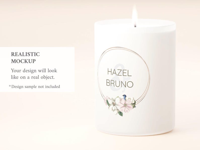 May include: A white pillar candle with a lit wick. The candle features a circular design with the names "HAZEL & BRUNO" and floral accents. Text on a card reads "REALISTIC MOCKUP. Your design will look like on a real object. *Design sample not included."