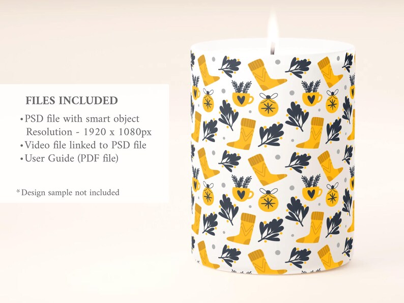 May include: A lit white candle with a repeating pattern of yellow boots, mugs, ornaments, and dark blue leaves. The candle has a white background. The text "FILES INCLUDED" is visible on the left.