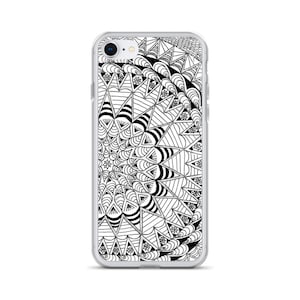 May include: A clear phone case with a black and white mandala design. The design is intricate and detailed, with a variety of shapes and patterns.