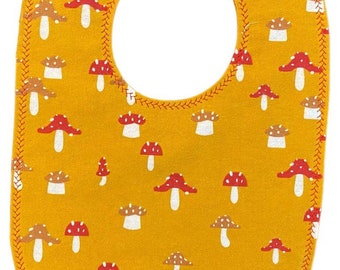 Golden Mushroom Toddler Bib