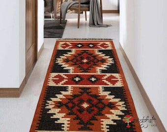 Alfombra Kilim tejida a mano en lana y yute. Alfombra Kilim Dhurrie hecha a mano con motivos orientales, tradicionales, indios, geométricos y turcos para la decoración del hogar.