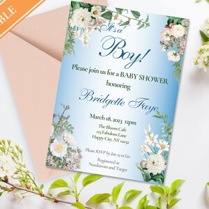 May include: A blue and white baby shower invitation with floral accents. It says "It's a Boy!" and includes the text "Please join us for a Baby Shower honouring Bridgette Faye. March 18, 2023 12pm The Bloom Cafe 123 Fabulous Lane Happy City, NY 0272 Please RSVP by Jan 25 to Lia Registered at Nordstrom and Target"