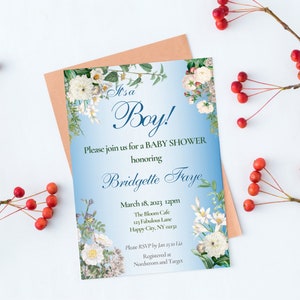 May include: A blue and white baby shower invitation with floral accents. The invitation reads "It's a Boy!" and includes the name "Bridgette Traye" and details for the event.