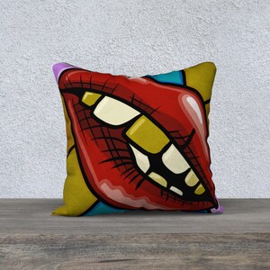 Coussin décoratif, taie d&#39;oreiller, bouche rouge avec dents en or, décor multicolore.