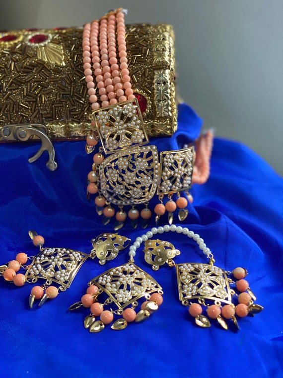 Indian Punjabi Jadau jewellery set in a variety of colours includes necklace tikka and earrings