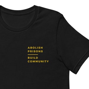 Gold Embroidery / Abolish Prisons. Build Communities. / Abolition / Abolish the police / Abolish ICE / Short-sleeve unisex t-shirt