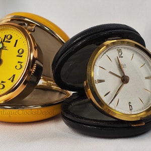1970’s French and Japanese Folding Alarm Clocks - Set of 2. Wind-up alarm clock, mechanical movement
