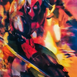 May include: A dynamic illustration of Deadpool, the Marvel Comics antihero, in a striking action pose. The character is clad in his signature red and black suit, with a mask featuring white eyes. The background is a vibrant blend of orange, red, and blue hues.