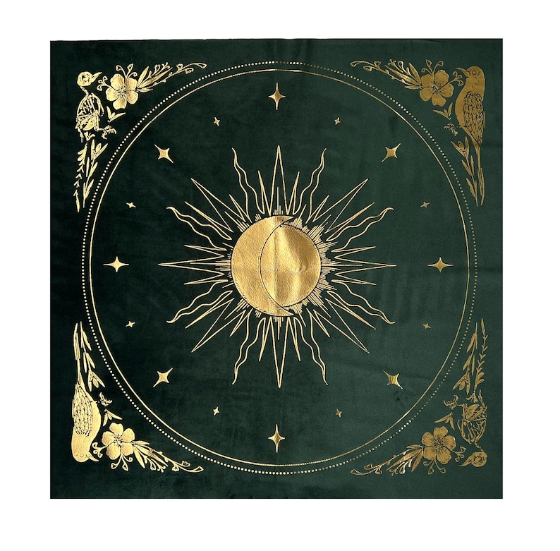 May include: A green velvet tapestry with a gold sun and moon design. The sun and moon are surrounded by stars and a decorative border of birds and flowers.