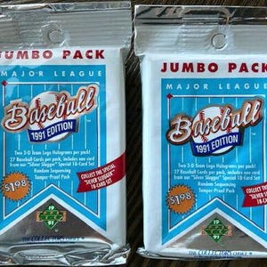 May include: Two sealed 1991 edition Major League Baseball Jumbo Packs. Each pack features a baseball graphic and the text "Baseball 1991 Edition". The packs include 27 baseball cards and a special 18-card set.
