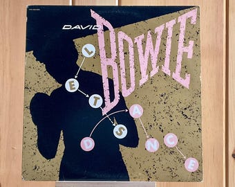David Bowie Vinyl 1983 "Let’s Dance" 12inch Dance Single Record Original pressing EMI America,NM Condition, Cat People B-Side CommonManCards