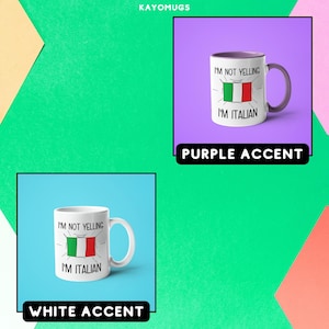 May include: Two white ceramic mugs with a black outline of the Italian flag and the text "I'm not yelling I'm Italian". One mug has a purple accent around the rim and the other has a white accent. The mugs are displayed on a colorful background.