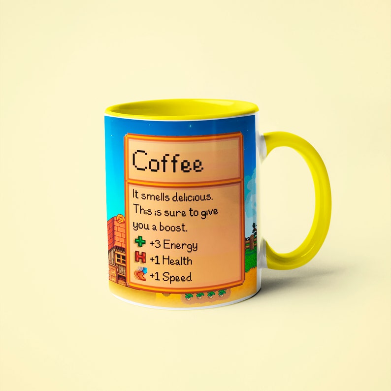 May include: A yellow coffee mug with a pixelated design of a video game item called "Coffee". The design includes the text "It smells delicious. This is sure to give you a boost." and the stats " +3 Energy +1 Health +1 Speed".