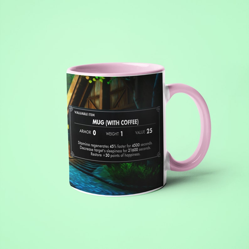 May include: A pink and white ceramic mug with a video game-style graphic. The mug features a dark background with a small wooden house and a river. The text on the mug reads "VALUABLE ITEM MUG (WITH COFFEE) ARMOR 0 WEIGHT 1 VALUE 25 Stamina regenerates 45% faster for 4500 seconds. Decrease target's sleepiness for 21600 seconds. Restore +30 points of happiness."